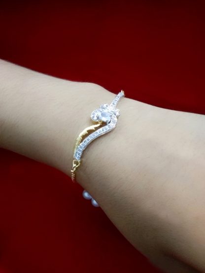 BR69 Daphne Sleek Zircon Gold Silver Plated Rakhi Bracelet For Raksha Bandhan Arm View